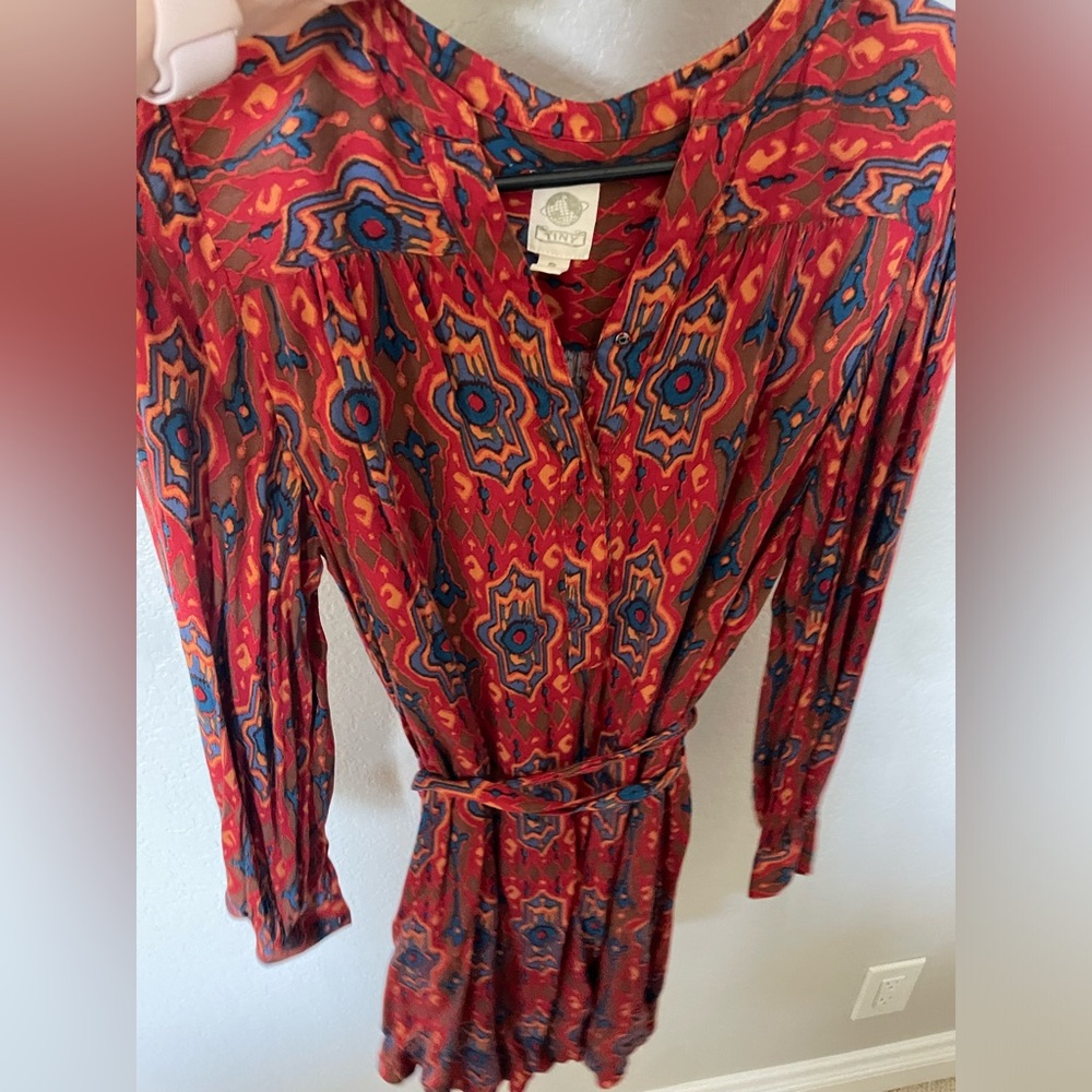 Anthropologie tunic dress brand is called Tiny